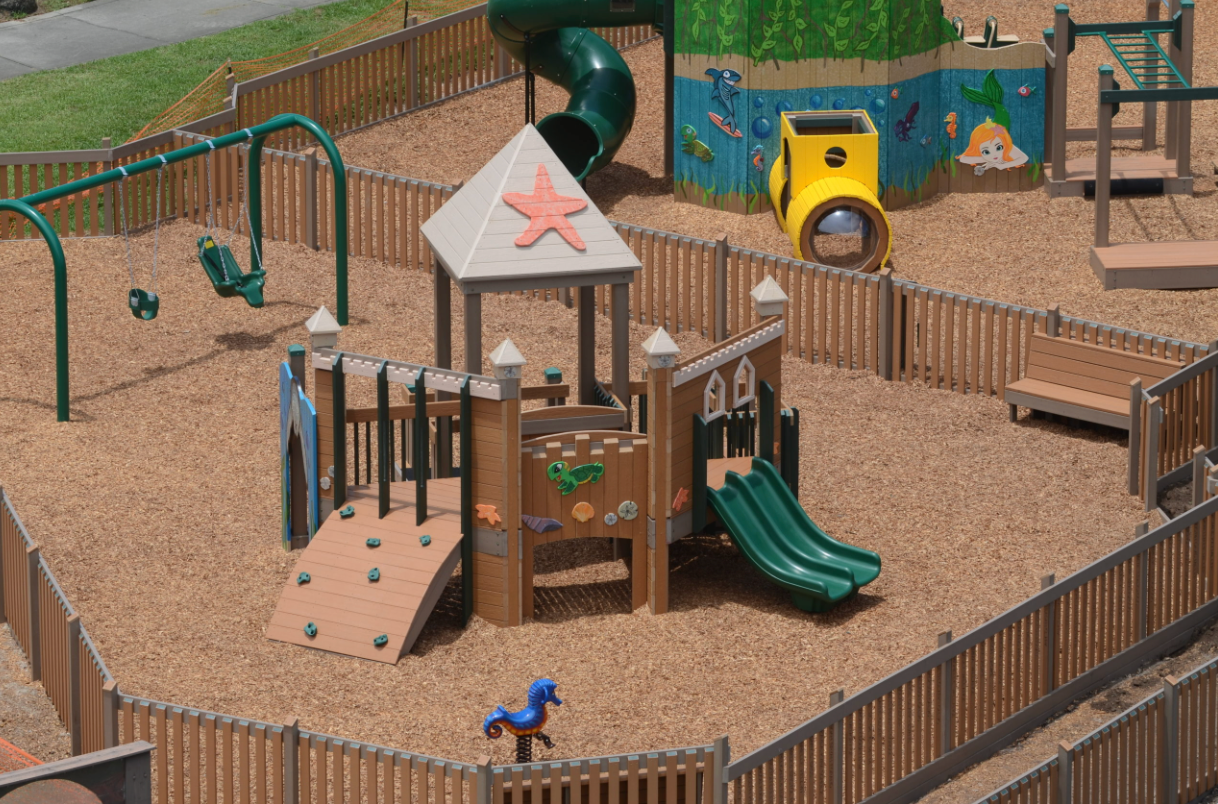 HDPE fence surrounding a children's playground, providing a safe, low-maintenance boundary with a clean, modern finish.
